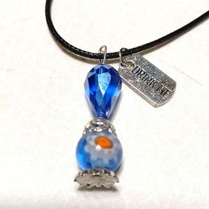 Alice in Wonderland potion bottle pendant flower blue silver tag crystal glass